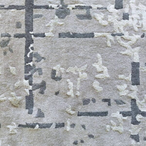 Close-up of the Axis hand-tufted New Zealand wool and viscose rug highlighting its architectural abstract texture, premium fibers, and handcrafted finish by FiRugs.