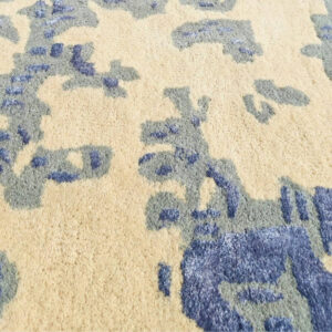 Close-up of the Patina rug by FiRugs showcasing its hand-tufted New Zealand wool and viscose pile, organic abstract texture, and premium handcrafted finish.